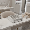 Nail dust collector on nail desk in a salon